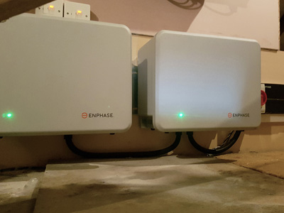 2 Enphase Energy AC batteries on kitchen wall