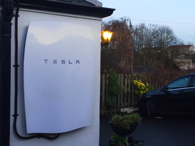 Tesla Powerwall battery on wall